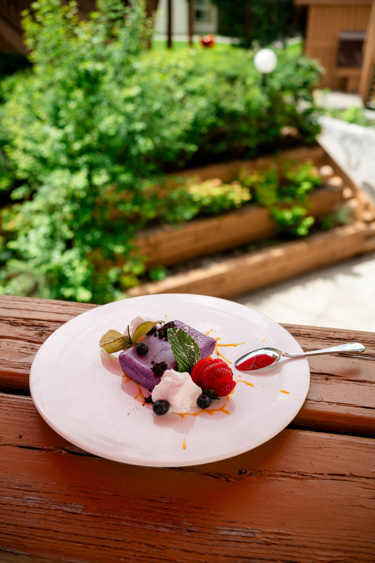 Vibrant purple Ube Yam Cheesecake dessert at Alpha Bistro, Banff Rocky Mountain Resort.